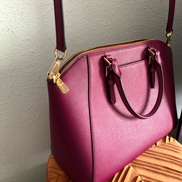 This is a brand new Micheal Kors genuine leather handbag and matching wallet. - Picture 9 of 10
